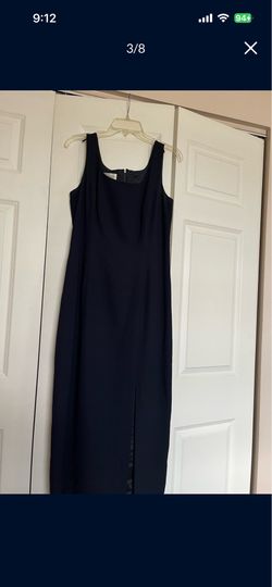 It’s A Beautiful Long Evening Dress For Woman’s The size is 10 The Color Is Navy Blue it’s made by Maggie London