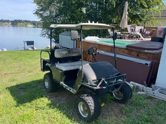 Lifted golf cart (needs battery)