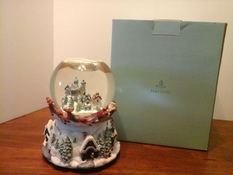 Party Lite snow globe Christmas musical lighted in box Excellent condition.