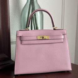 Cherry blossom pink structured bag with golden hardware