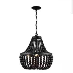 Cayman 3-Light Black Chandelier Light Fixture with Black Faux Wood Beaded Shade.   retail price $157 our price $80   Hampton Bay Model # C7057-BK  L-4