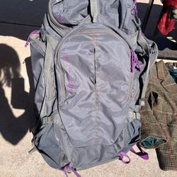 50L WOMEN'S BACKPACKING BACKPACK GREY AND PURPLE