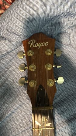 Royce 6 string acoustic with case