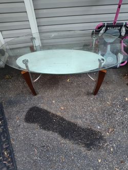 Oval shaped Glass Top Coffee Table