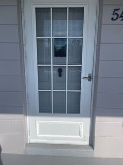 36” White colonial storm door White colonial storm door