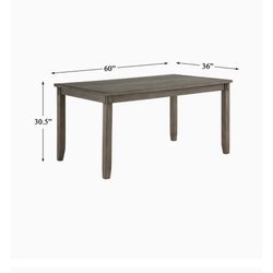 Beautiful wood dining table by Pemberly Row 