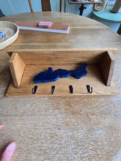 Maple key shelf with lake Geneva cut out.