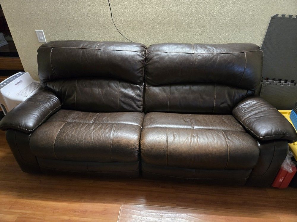 Leather Reclining Loveseat – Works but Needs Repair or Used Against a Wall