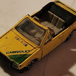 Vintage Yellow Ford Escort Cabriolet 1/64
