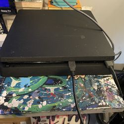 PlayStation 4 with controller one game