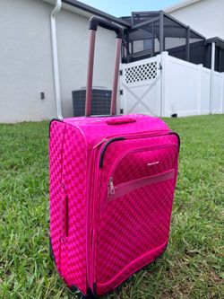 Selling a pink checked suitcase, 27” x 17” x 11.5”.