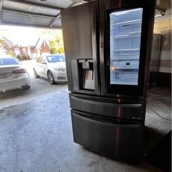 Big beautiful Lg black stainless refrigerator