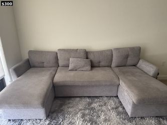 Grey Sectional Sofa w/ Pull-Out Bed & Storage