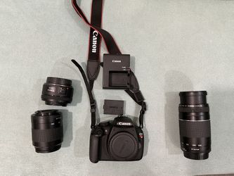 Canon EOS Rebel T5 18.0 MP DSLR Camera with 50 mm, 80-200 mm And 75-300 mm Lens.