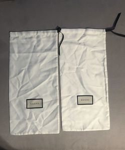 White Gucci dust bags