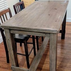 Counter height dining table