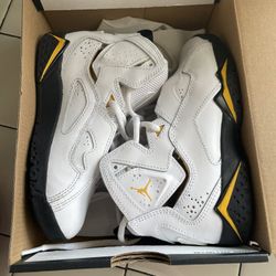 White Yellow and Black Jordan’s 