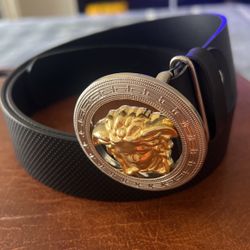 Black belt with gold and silver buckle, can be modified to a smaller size. size 36