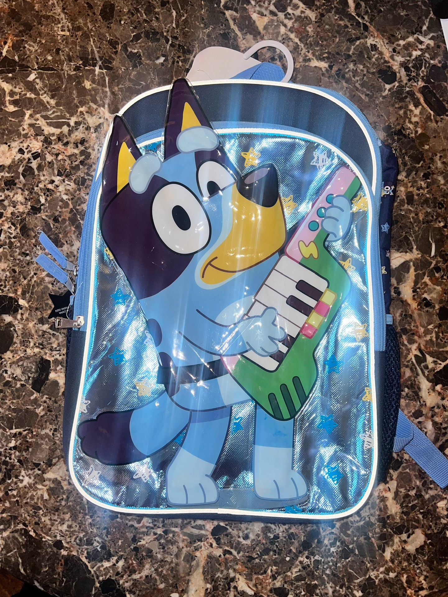 Brand New Bluey playing the guitar backpack