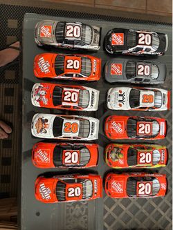 NASCAR lot of 12  #20 Tony Stewart 1/24 scale diecast cars