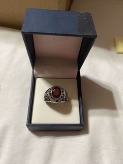 Jostens Class Ring with Red Stone