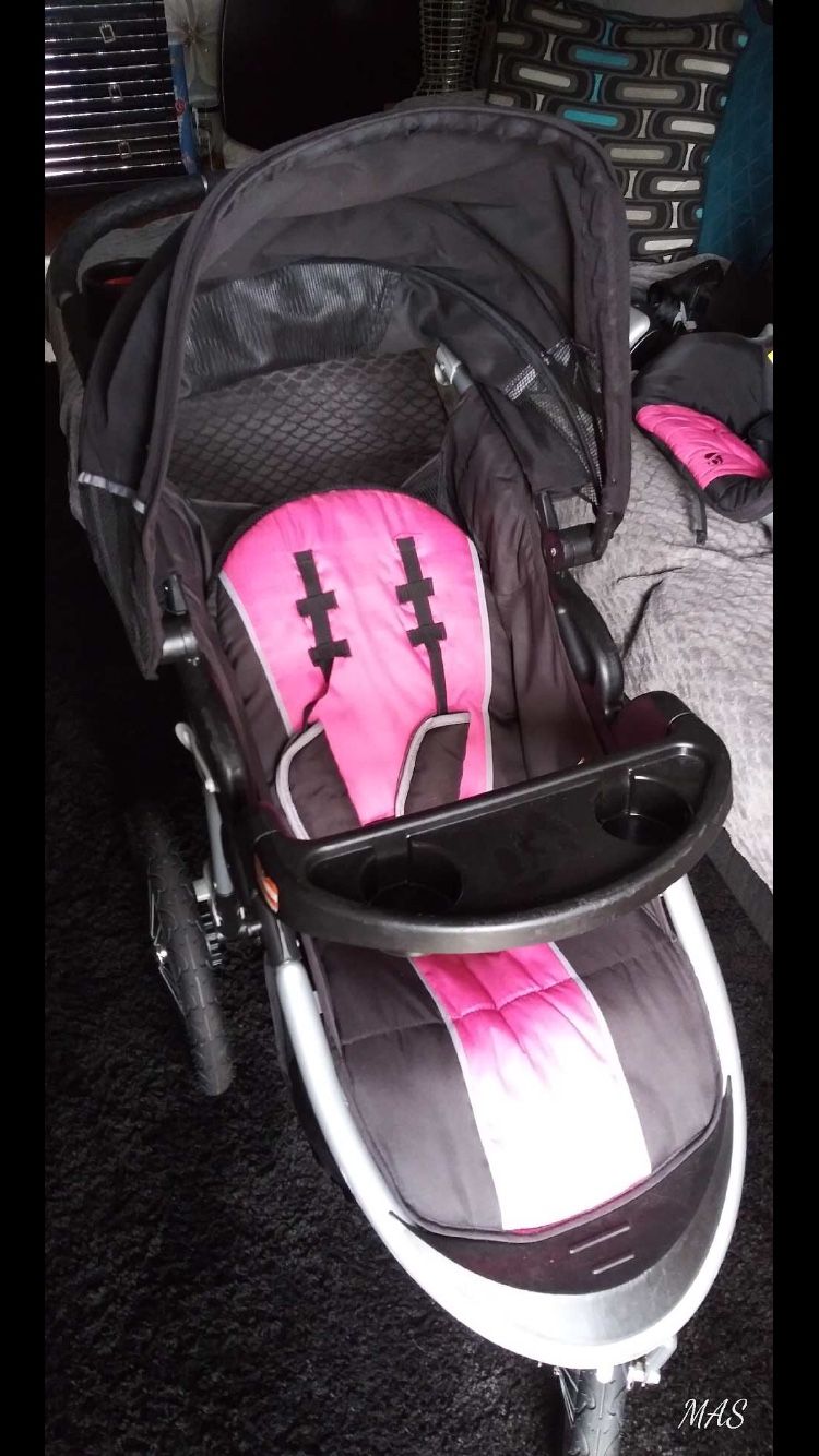 Baby stroller with car seat.