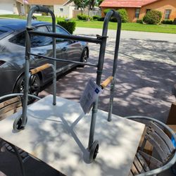 Brand New Folding Walker, Two Button with 5" Wheels read description for details see pictures