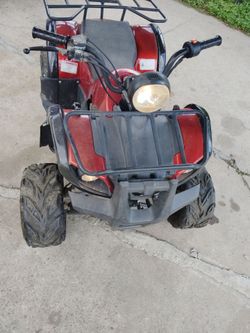 125c automatic four wheeler with reverse new battery runs good