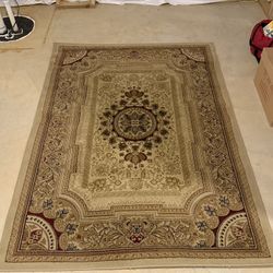 Tase Area Rug