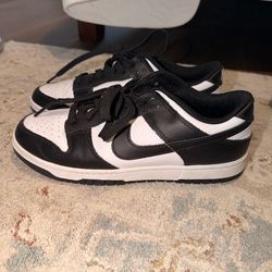 UCLA Athletics Nike Dunk Low sneakers in the popular black and white "Panda" colorway