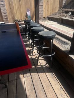 Set of 6 Metal Bar Stools with Black Cushions and a Pub Table