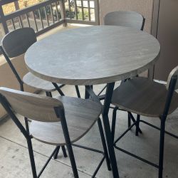 Table And 4 Chairs 