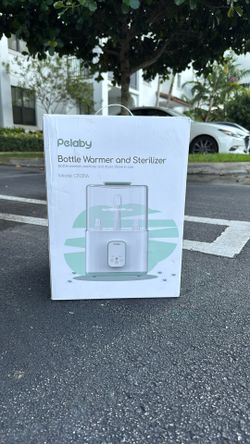 Peacy Bottle warmer And sterilizer-never Used. Open Box