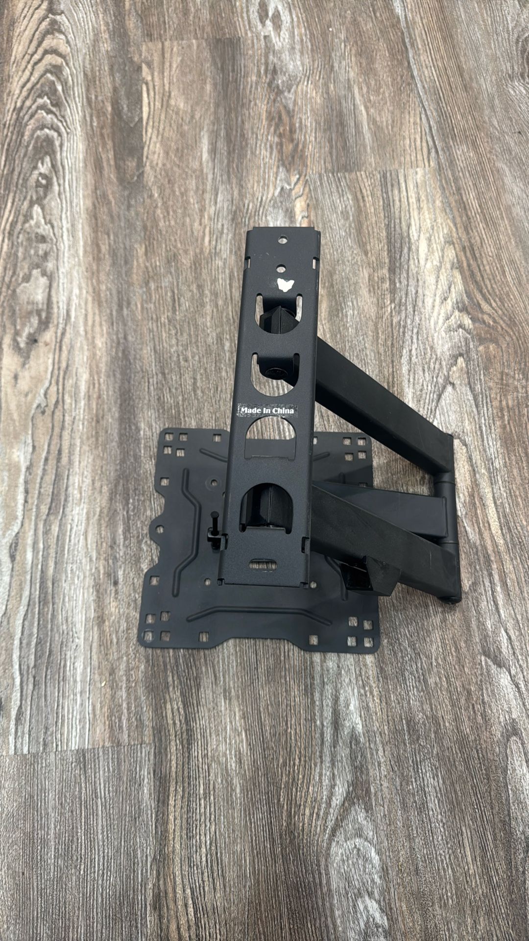 full-motion articulating TV wall mount.