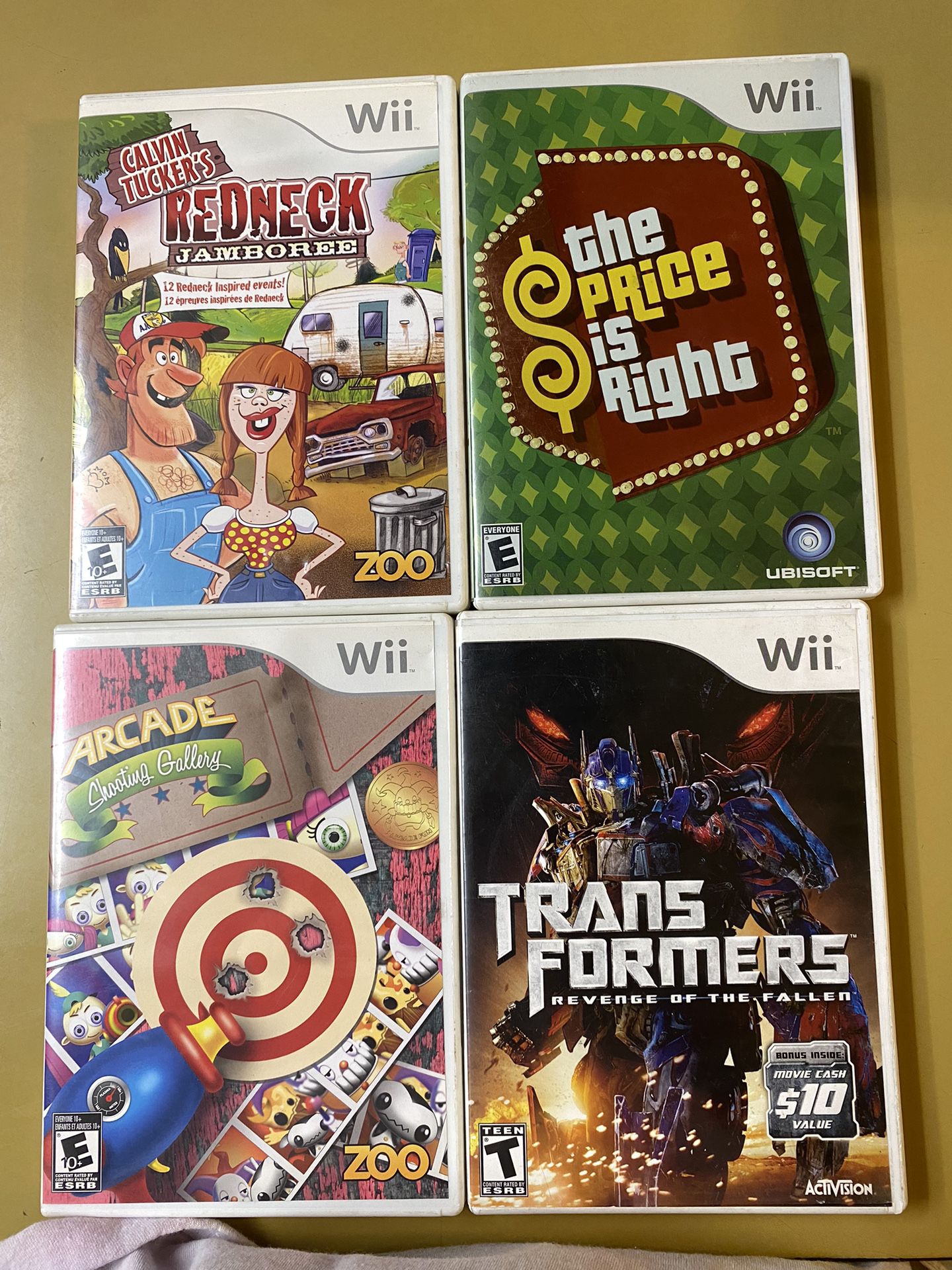Nintendo Wii Game Lot (transformers,the price Is Right ,arcade Shooter,red neck Shooter)