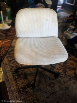 White corduroy, chair and black leather chair