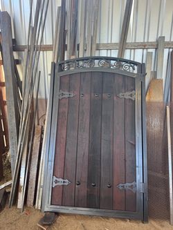 Wood and Wrought Iron Arched Garden Gate