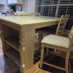 High top dining table with four chairs