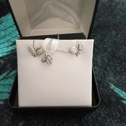 Sliver And Diamond Butterfly Necklace And Matching Earrings .Asking Price 60.00 Original Price Still On There.