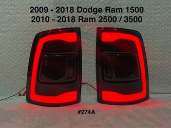 2009 to 2018 Dodge RAM 1500 / 2019 to 2022 RAM 1500 Classic / 2010 - 2018 RAM 2500 / 3500 Red LED Bar Tail Lights (Matte Black Housing/Smoked Lens) AN