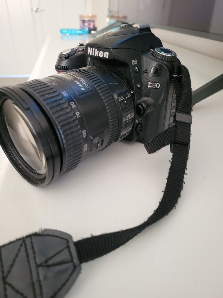 Nikon D90 W/ 18-200MM lens