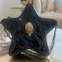 Kurk Geiger black crossbody purse with gold straps