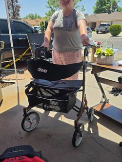 Drive walker with seat and front wheels