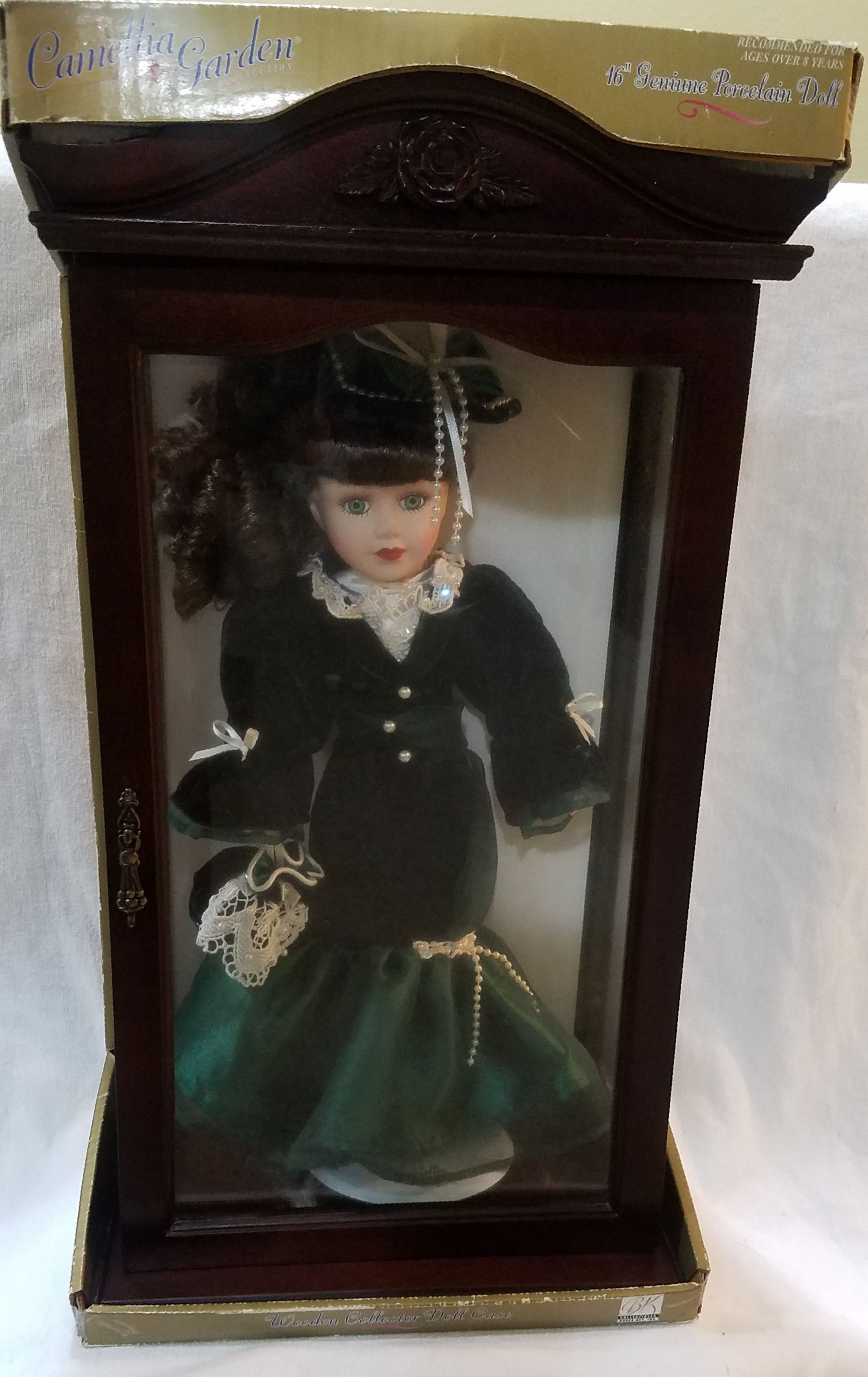 4 $$$ale!!!! Collectable Porcelain Camellia Porcerlane doll in wooden case