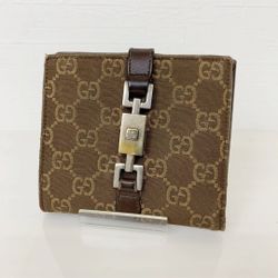 Beautiful  Authentic GUCCI Canvas  and leather bifold wallet GG pattern with lock  used 