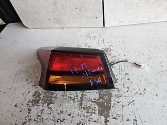 Nissan Altima left tail light Oem