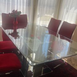 Dining Table With Six Chair With Red Sheets