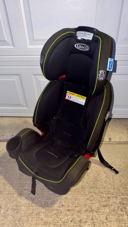 Graco Grows4Me 4-in-1 Car Seat (green/black).