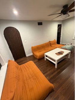 Orange couches / beanbag chairs