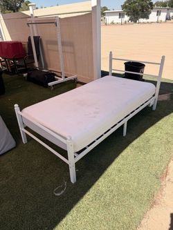 White Metal Twin Bed Frame with Mattress and Power Outlet